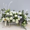 This fresh design is made with white spray roses and lisianthus in