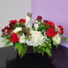 PINE GREENS PINECONE RED ROSES AND CARNATIONS WHITE HYDRANGIA AND MUMS IN