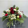 Send season&#039;s greetings with this Wonderland arrangement. A beautiful assortment of Roses