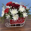 Santa&rsquo;s sleigh decorated in this keepsake sled that your recipient can enjoy