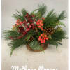 basket filled with xmas greens, plaid bow, pine cones and berries