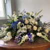 all blue and white flowers for this lovely casket cover: flowers like:
hydrangeas