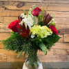 A fresh vase filled with Christmas colors, and seasonal flower!
Seasonal Flower Substitutions