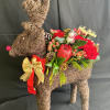 Bring the christmas spirit with this fun and wonderful christmas deer arrangement.