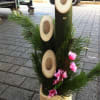 Traditional Kadomatsu with pink cherry blooms and pine, available in various sizes