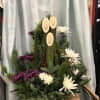 Formal and elegant spider mums paired with stately Kadomatsu bamboo with holiday