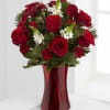  Rich red roses, lush holiday greens and a touch of white-