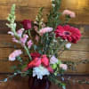 Fresh Cut Arrangement Made Up in Shades of Pinks and Reds with