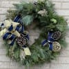 A beautiful custom fresh wreath, perfect for the holidays. Brighton your front