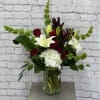 Send a kiss to your loved one with this beautiful vase arrangement