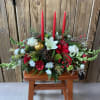 A centerpiece for the holiday dinner table. Can choose how many candles