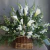 A serene and graceful tribute, This arrangement brings quit comfort during moments