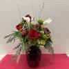 This Christmas bouquet stays true to its name! Merry details including Christmas