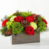 Filled with the essence of warmth and coziness, the Bundled Up Bouquet