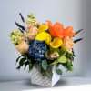 Type of Flowers:Orange Asiatic Lilies, Yellow Mini Calla Lillies, Blue Hydrangeas, Seasonal