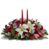  A beautiful holiday centerpiece with White Lily, Red Carnations, Silver Pine