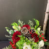 A low vase arrangement filled with festive fun for the table.