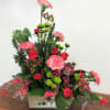 Beautiful and bright flowers in red and lime green, accented with a