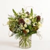 The beauty of the Rocky Mountains woodlands inspired this quietly luxurious arrangement.
