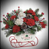  Festive keepsake sleigh container filled with fresh Christmas greens and red