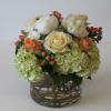 Some of the flowers in the arrangement are seasonal. Please call to
