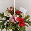 White orchid cymbidiums with a deep Christmas red, fresh wintergreens, red poinsettia