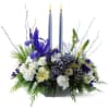 This lovely silver, white and blue centerpiece featuring silver candles is ideal
