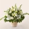 &ldquo;Celebrate the elegance of simplicity with this stunning white floral arrangement. Featuring