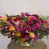 A beautiful fall arrangement with vibrant colors 
