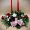 This is a 2 Candle centerpiece for the holidays. Flowers in this