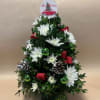 Our most popular holiday arrangement, this holiday tree will include: White Cushion