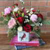 The &quot;Cardinal&#039;s Song Christmas Bouquet&quot; by Venetian Flowers a stunning floral arrangement