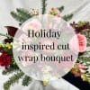 A beautiful cut wrap bouquet of seasonal flowers, hand picked by our