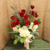 One Dozen roses arranged in a matte gold vase with white hydrangea