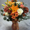 Embrace the beauty of fall with our exquisite fall Blossoms arrangement!
Handcrafted with