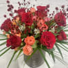 Dozen upscale red roses and spray garden roses mixed with rich fillers