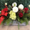 Spread holiday spirit with the Ruth Messmer Florist Christmas Charm Centerpiece. Designed