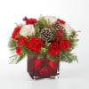 An aromatic experiece, the Christmas Market Bouquet includes assorted seasonal greens to