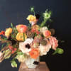 The Golden September is a stunning fall flower arrangement that evokes the
