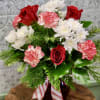 A holiday version of our bestselling Blissful Blooms bouquet. 