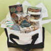 An assortment of delicious hand made chocolates in a canvas tote. Gift