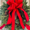 A 24in fresh wreath comprised of Balsam, Cedar, &amp; Juniper with pinecones