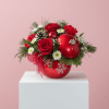 A fun and festive holiday mix designed inside a shiny red ornament