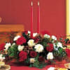 This is the perfect centerpiece for the season. Red carnations, red spray