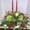 Send season&rsquo;s greetings in classic style. Our charming Christmas centerpiece is hand-arranged