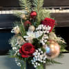 Send out this lovely Christmas tree arrangement. This designers choice Christmas themed