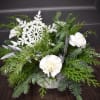 Just like a gentle snowfall, this arrangement is a beautiful sight to
