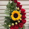 Beautiful arrangement in the shape of a staircase decorated with Red Roses