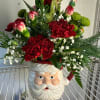 Jolly Old Saint Nicholas brings your flowers with this amazing array of