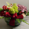 Velvet reds,greens,blush and a touch of pink floral nestled with evergreens in